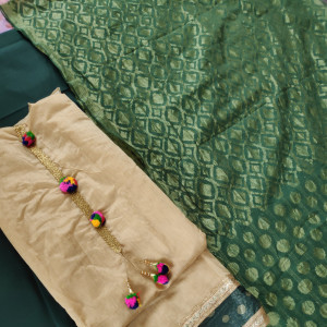 Dark Green color Unstitched Suits - Festive Wear Chanderi Suit With Net Heavy Dupatta