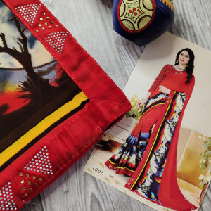 Red color Beautiful Printed Saree with Swarovski work Border