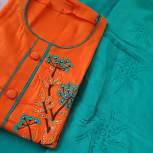 Orange color Beautiful Embroidered Party Wear Suit With Chanderi Dupatta