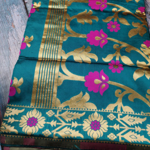 Rama green color Heavy Jaal Pattern Silk Saree