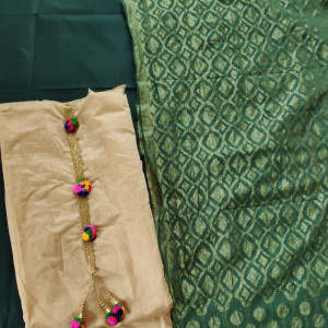 Dark Green color Festive Wear Chanderi Suit With Net Heavy Dupatta