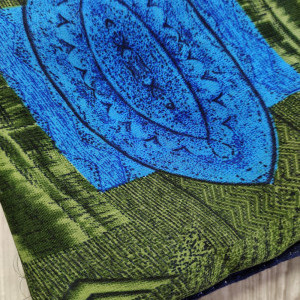Green color Beautiful Printed Saree with Swarovski work Border